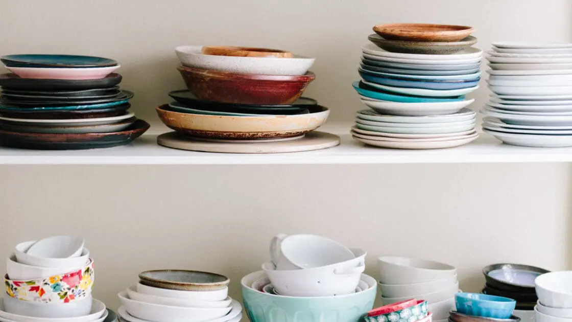 stacked kitchen dishes clutter
