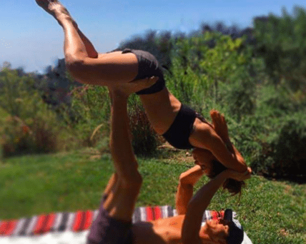 Nikki Reed's All About Acro Yoga But Should You Try It?