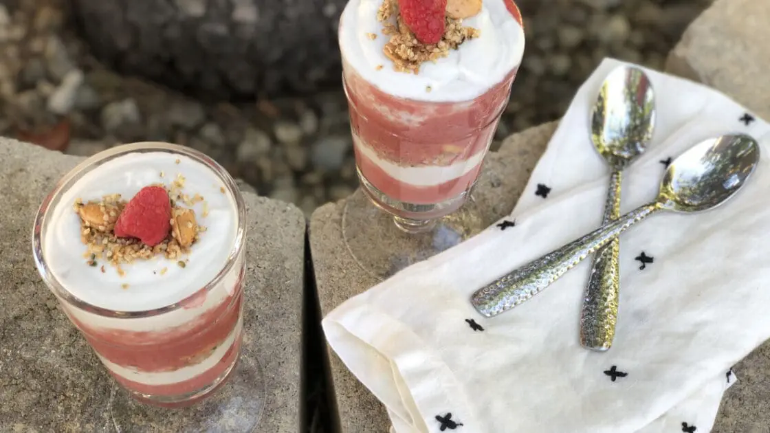 Two glasses of raspberry coconut parfait.