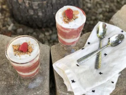 Two glasses of raspberry coconut parfait.