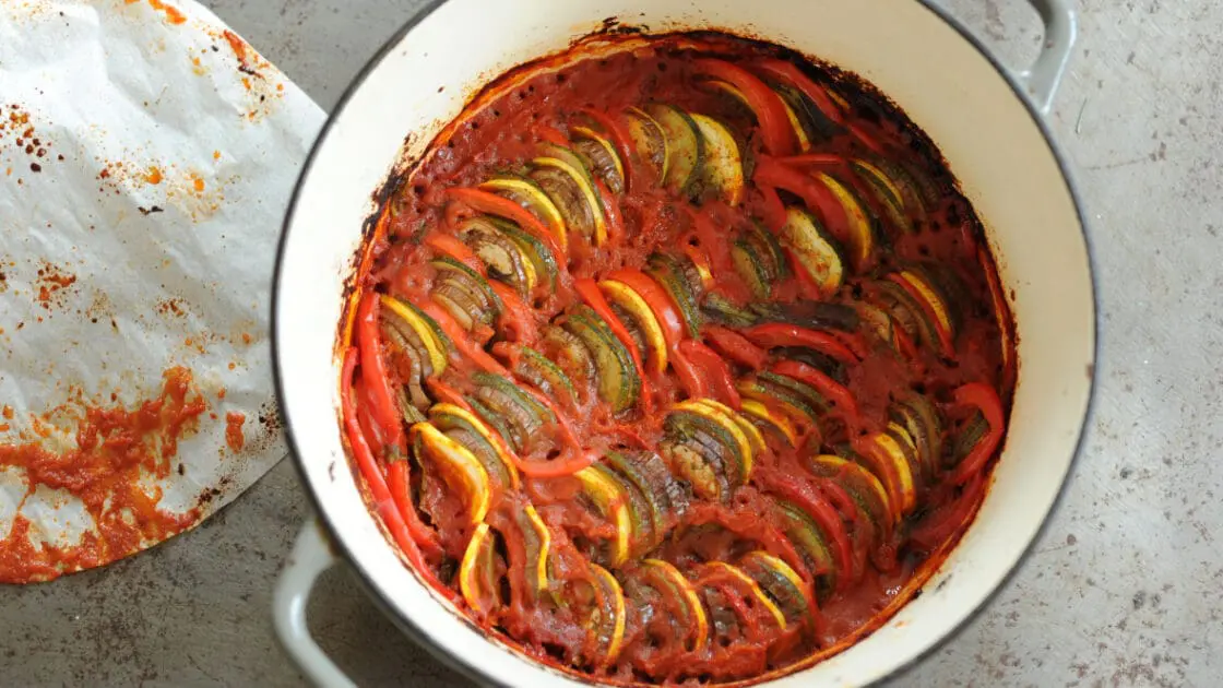 image of vegan ratatouille in a dutch oven.