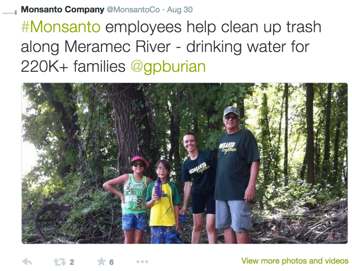 Monsanto Company tweet about employees cleaning up trash along the Meramec River, with a photo of four people in a forest