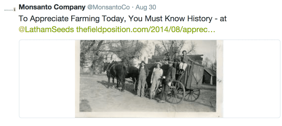 Monsanto Company tweet on appreciating farming history, with a vintage photo of people beside a horse-drawn cart