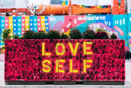 Love self on a city planter.