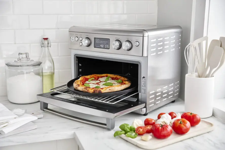 Image of the GreenPan Air Fryer in stainless steel with a personal pizza on a pan.