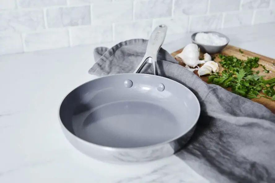 Image of a GreenPan Valencia Pro frypan with their proprietary nonstick coating, shown on a marble counter.