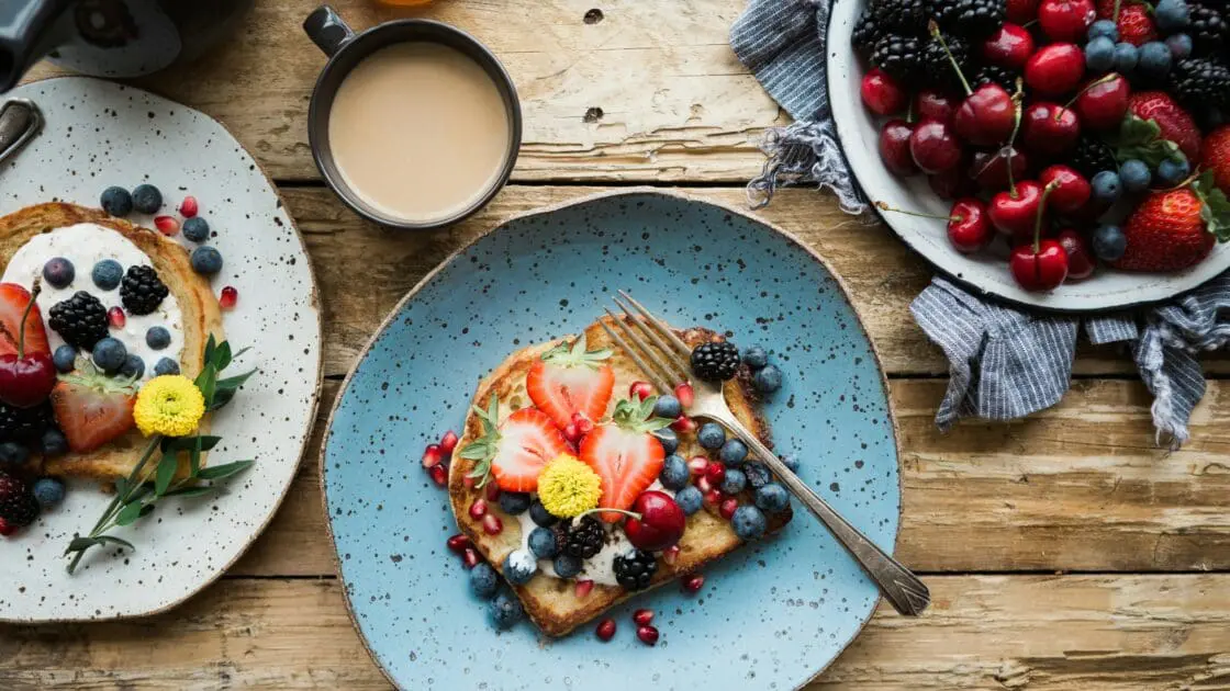 Image of French toast with berries, made from a simple recipe that calls for rich brioche and bright, fresh organic berries.