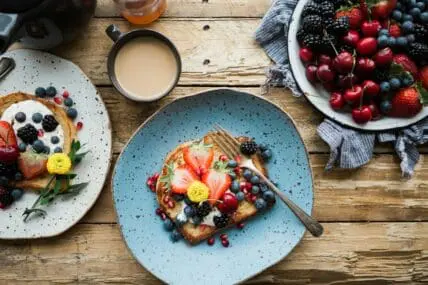 Image of French toast with berries, made from a simple recipe that calls for rich brioche and bright, fresh organic berries.