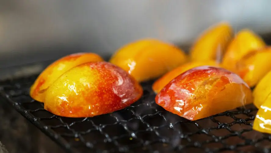 grilled peaches on grill