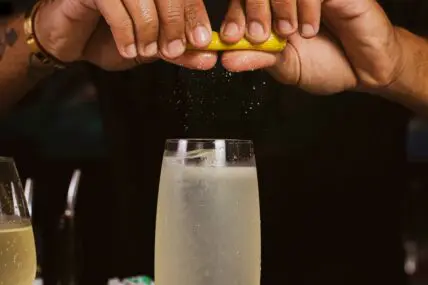 cocktail using champagne jonathan borba unsplash