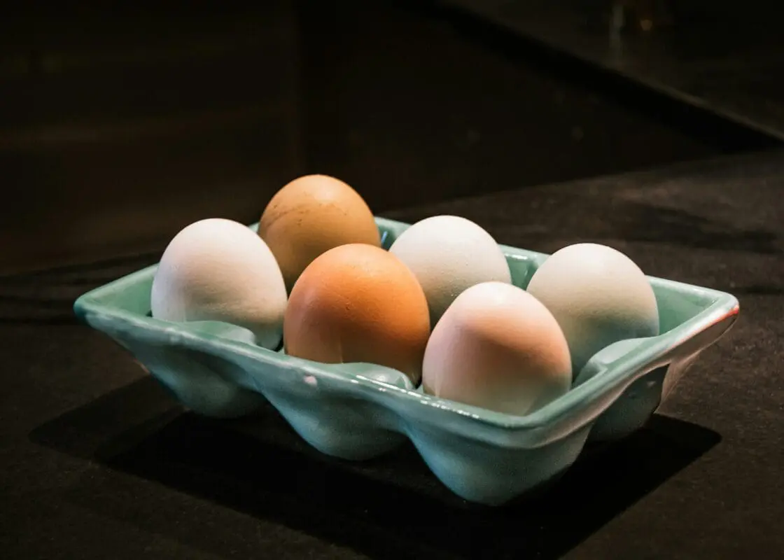 Image of different colored eggs from different breeds of chickens which are a way to naturally color your easter eggs