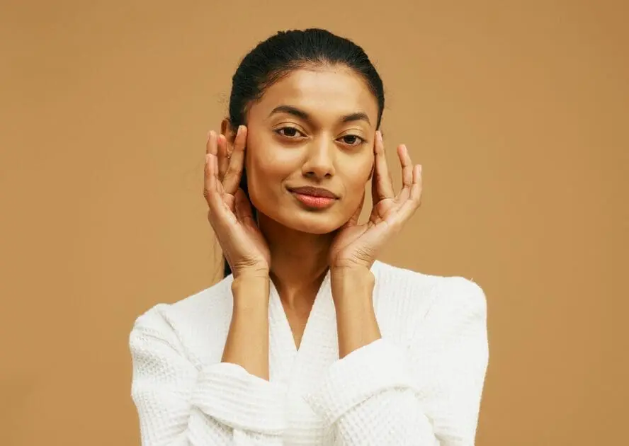 Image of a woman with glowing, healthy skin, which can be supported and maintained with a Dyson humidifier.