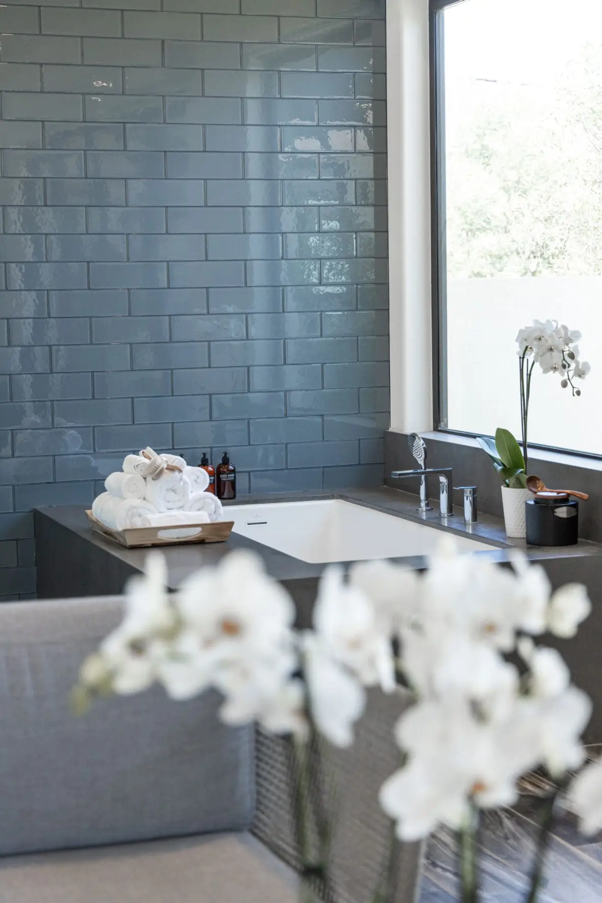 image of the soaking tub at We Care Spa with a window overlooking nature.