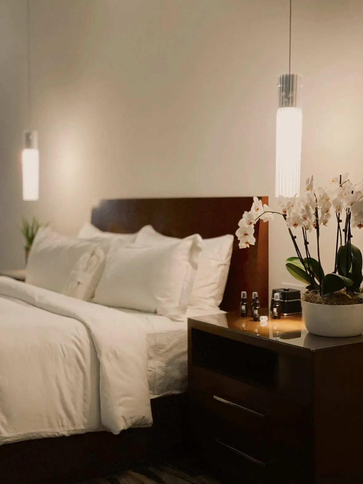 Image of a luxurious bed at We Care Spa California, a wellness retreat