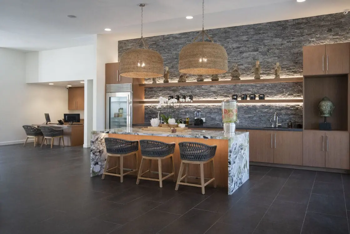 The lobby with a large, welcoming island with infused water to greet you at this wellness retreat.