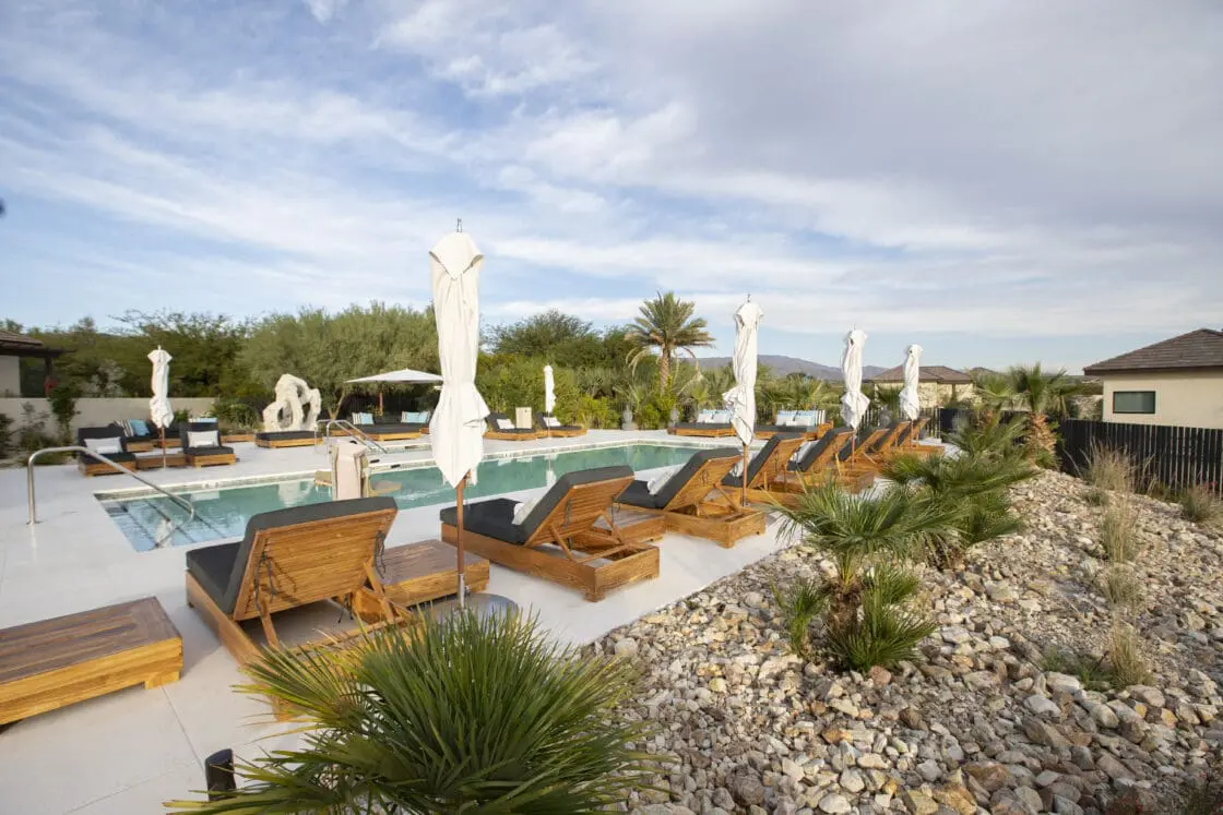 image of the deck of the saltwater pool, surrounded by the desert in California.