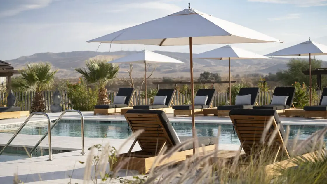 We Care Spa California view of pool looking out to the mountains in the background. A gorgeous place to detox and reboot.