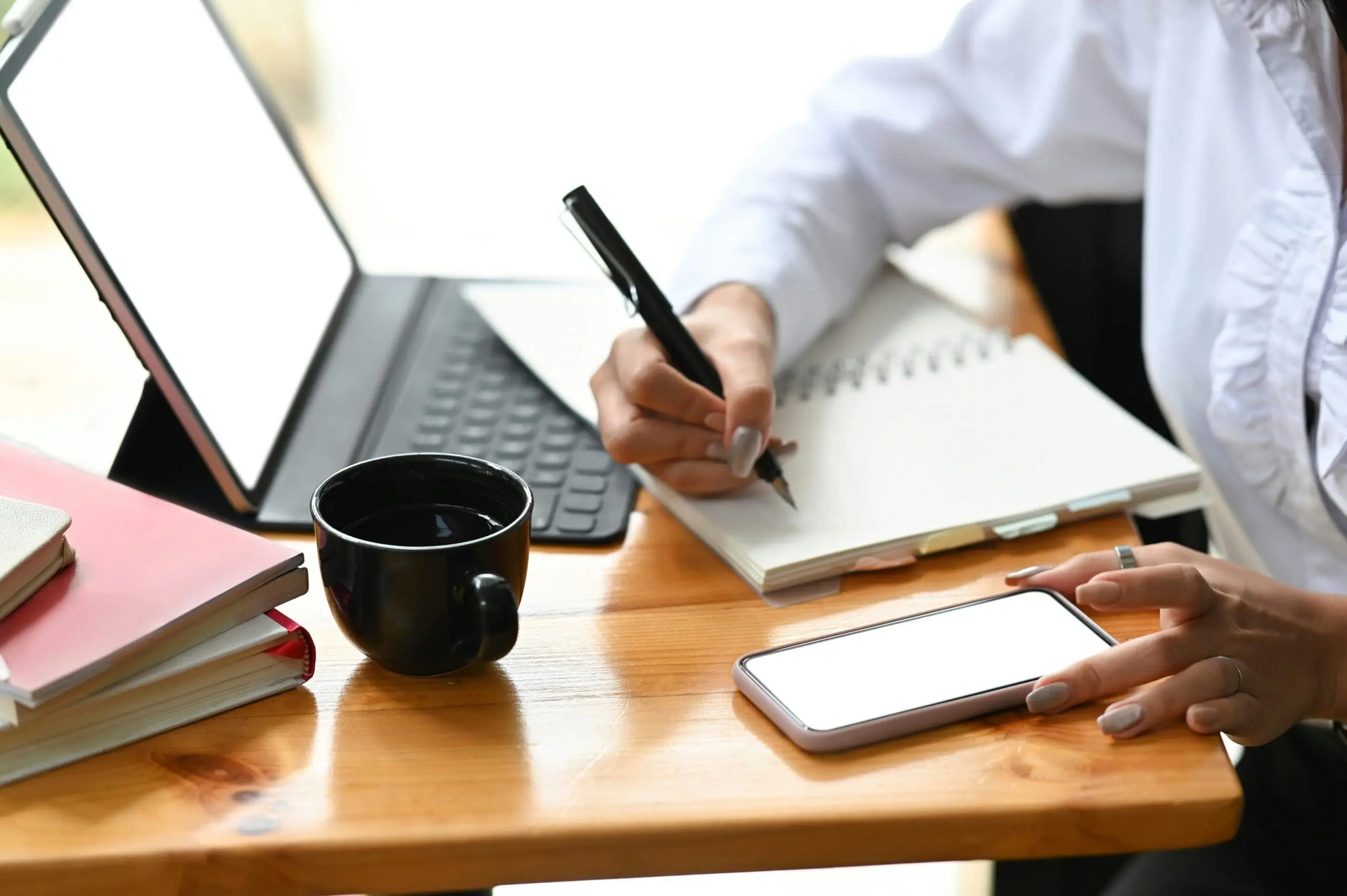 Image of woman making of a list of what