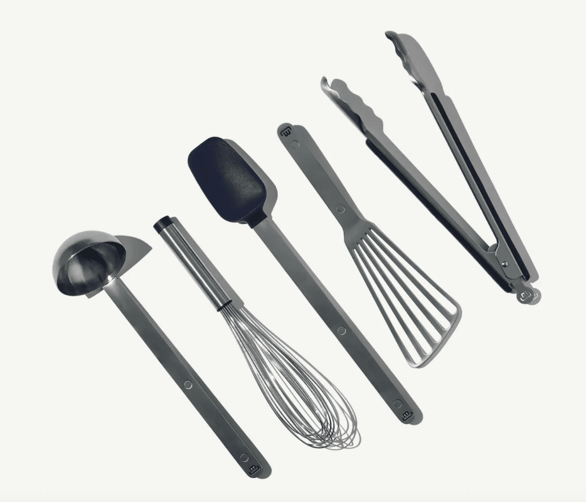 Image of a five-piece set of Made In stainless steel cooking utensils set against a white background.