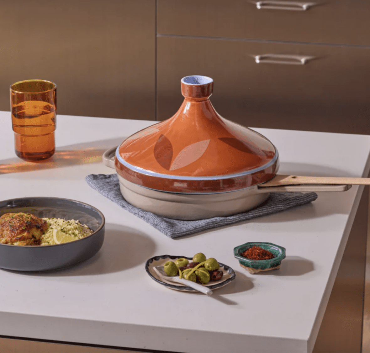 Image of the Our Place Tagine in Olive & Clay resting on the Always Pan.