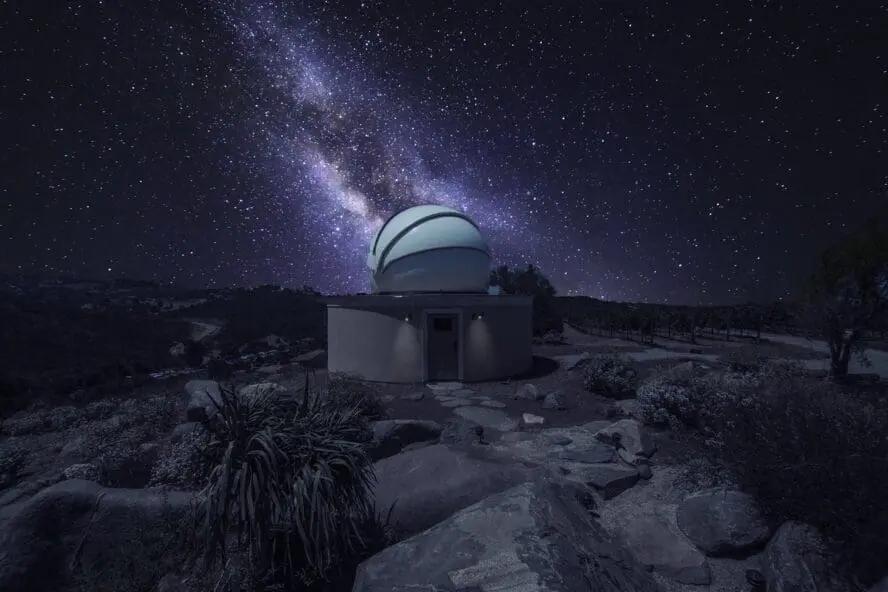 Image of the Cal-a-Vie Health Spa observatory, bathed in starlight at night.