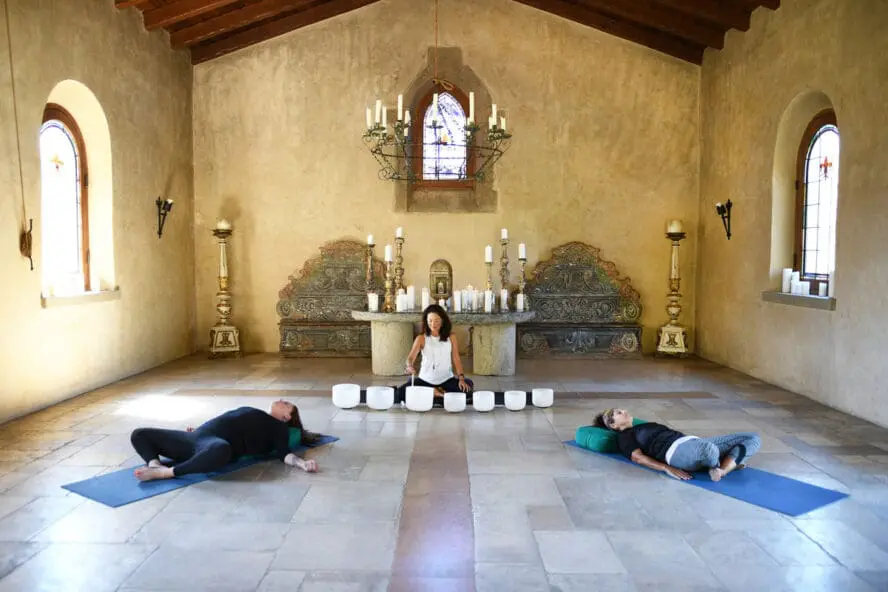 Image of a sound bath meditation session being conducted in the chapel at Cal-a-Vie Health Spa in California.