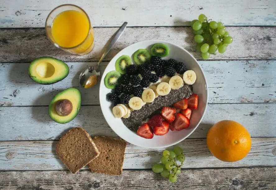 Image of a beautiful bowl of oatmeal topped with fresh fruits. In my Nourish review, I'll cover how to get access to recipes like these via the Nourish app.