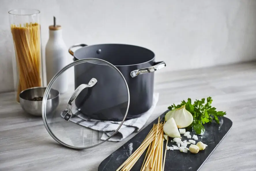 Image of a GreenPan Valencia Pro stock pot with pasta prep in a plate around it.