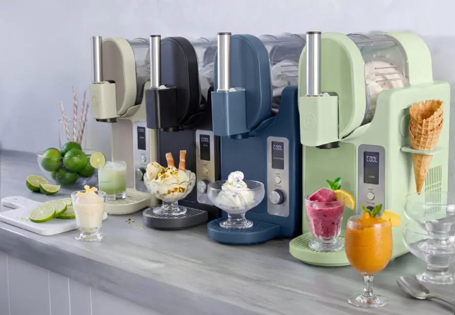 Image of four GreenPan Frost Pro appliances lined up in different colors, shown in front of different treats.