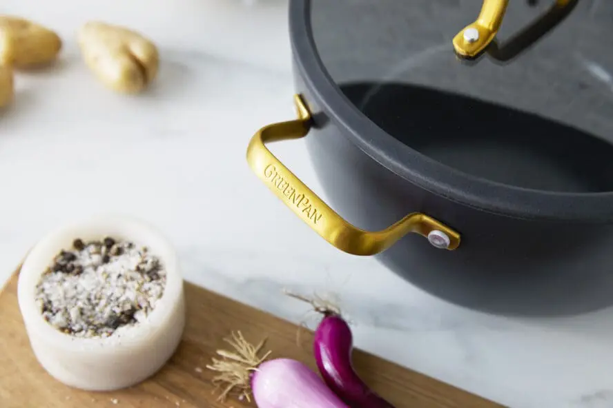 Image of an upclose view of the details on the GreenPan Reserve Pro gold handles