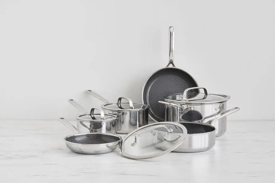 Image of all of the cookware pieces in the GreenPan Spectra 11-piece set arranged on a countertop.