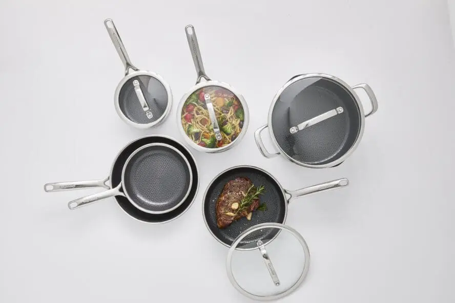 Overhead image of pieces in the GreenPan Spectra line, including frypans, a stockpot, sauté pan, and more.