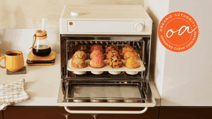 Image of the Our Place Wonder Oven Pro with an open door and a small batch of muffins.
