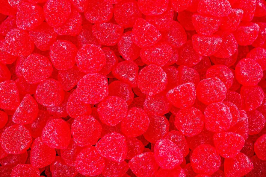 Image of red candies created with artificial dye.