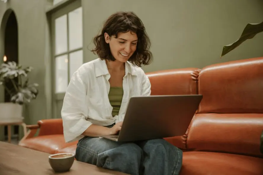 nourish review, woman looking at computer look studio unsplash