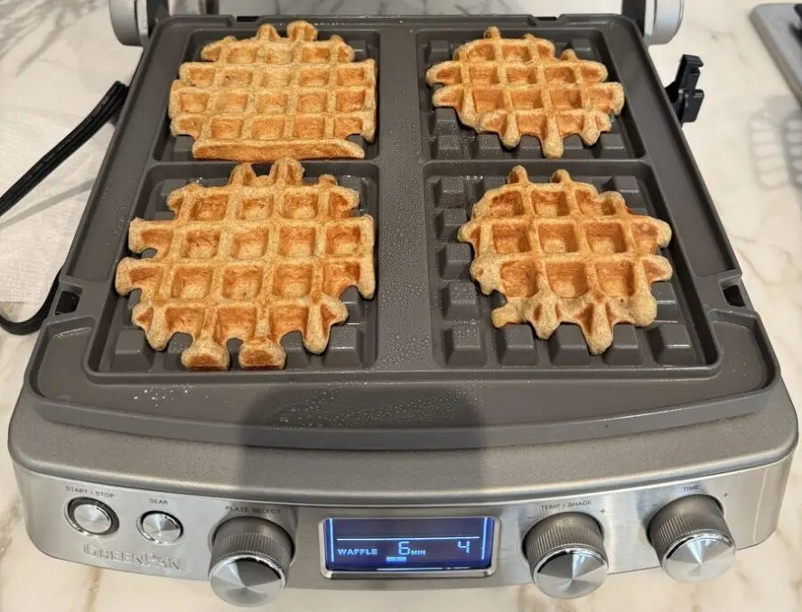 Image of the GreenPan Elite Multi Grill & Griddle shown with four individual waffles.