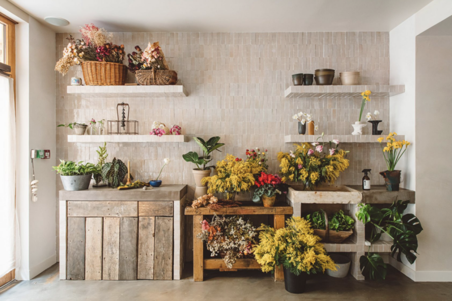 Image of a wall of gorgeous fresh flowers in a shop at HOY Hotel.