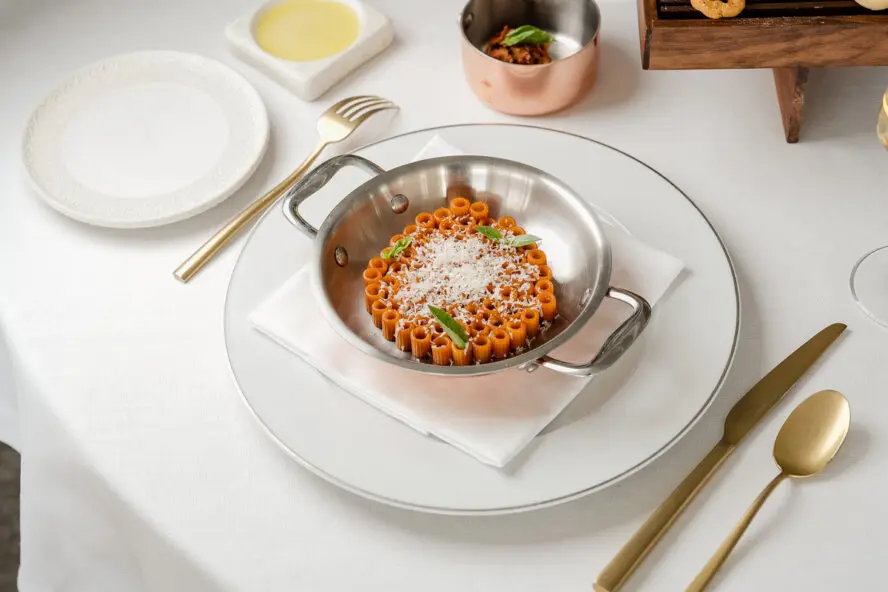 Image of a beautiful plate of pasta set in fine dining fashion at Michelin-starred restaurant Vesuvio.