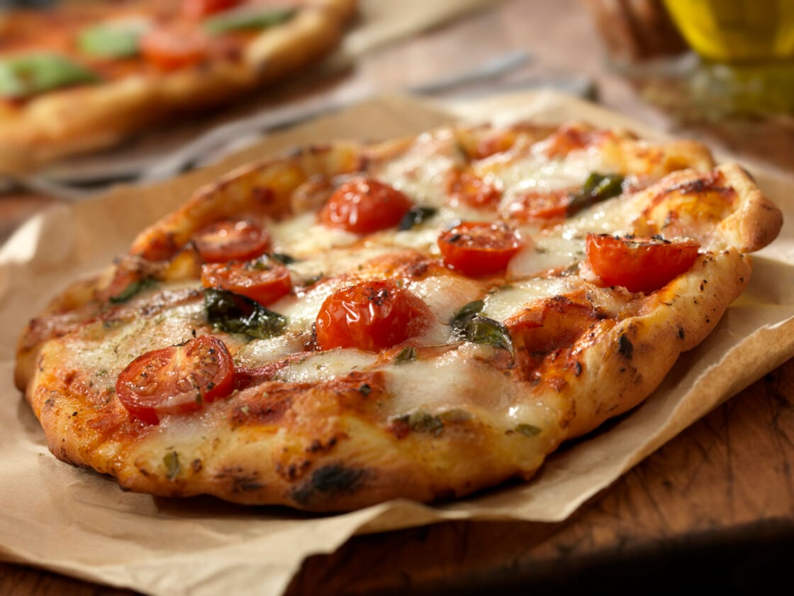 Authentic Italian, Hand Made Margherita Pizza with Fresh Mozzarella,Tomatoes and Basil - Photographed on a Hasselblad H3D11-39 megapixel Camera System