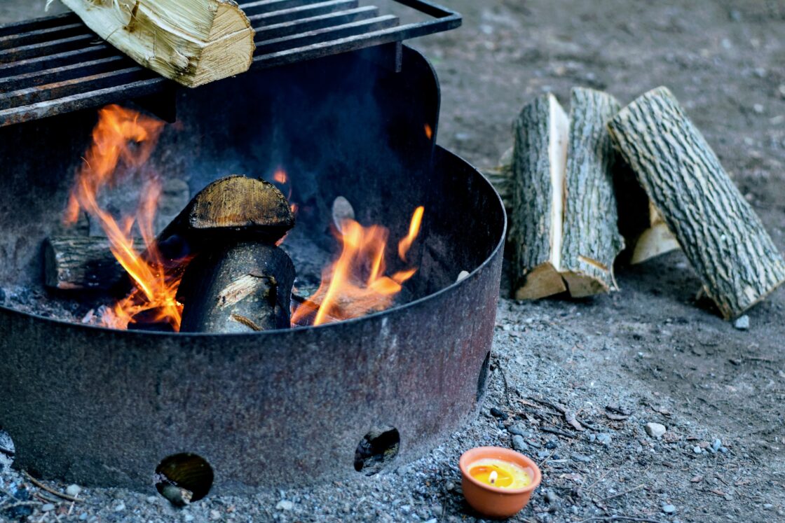 campfire pit with grill and wood