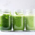 Image of three jars filled with green drinks on a kitchen counter. Your guide to the best greens powders and supplements. The best greens powder may help supplement any gaps in your diet. Greens powders can be a useful tool in any wellness kit. Most greens powders can help up your nutrition game. In our busy world, it's hard getting all your fruits and vegetables in daily.