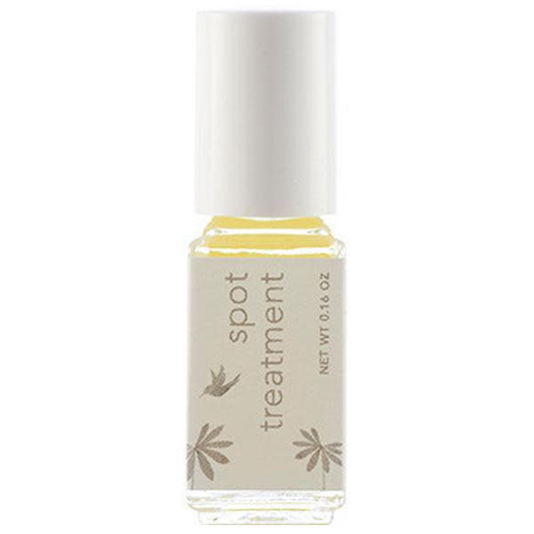 Spot treatment serum bottle with white cap and beige label
