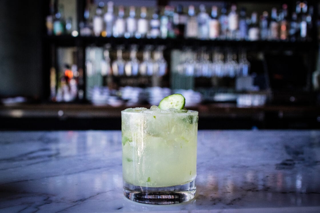 image of a eco-friendly margarita as part of a sustainable spread.