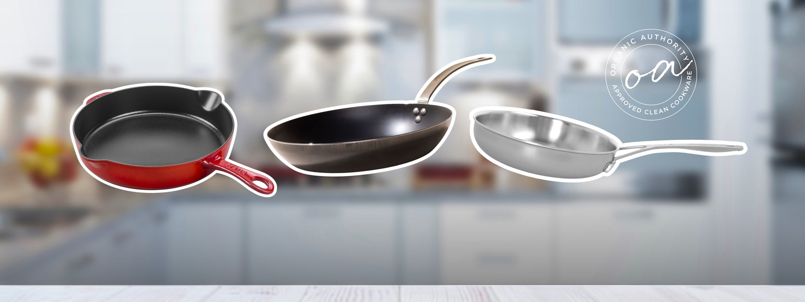 Image of 3 pans (carbon steel, cast iron, and stainless steel) in a graphic with a bright, blurred kitchen in the background showcasing the difference between carbon steel vs stainless steel vs cast iron)