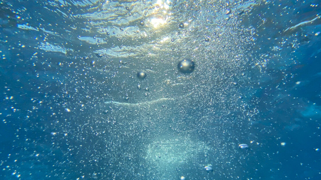 bubbly water swimming. collagen peptides and collagen supplements may help health gut and digestion issues.