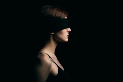 blindfolded woman dopamine detox