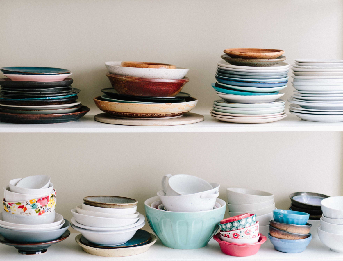 stacked kitchen dishes clutter