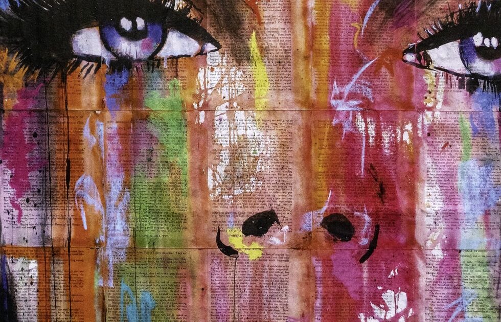 artwork painting of woman's face with water colors rolling down face