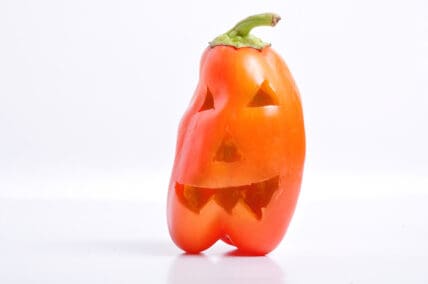 Festive Halloween-Themed Stuffed Red Bell Pepper Jack-O’-Lanterns Recipe