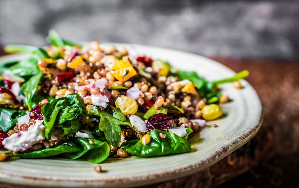 Quinoa salad with fresh figs, asparagus, and mint